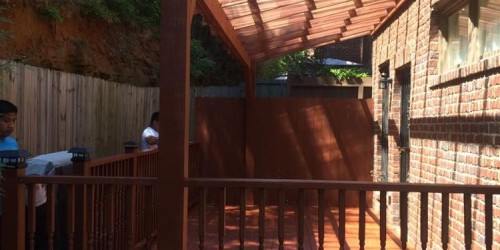 Deck with a clear corrugated roof system 