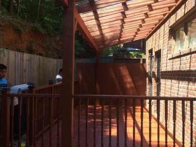 Deck with a clear corrugated roof system 