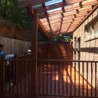 Deck with a clear corrugated roof system 