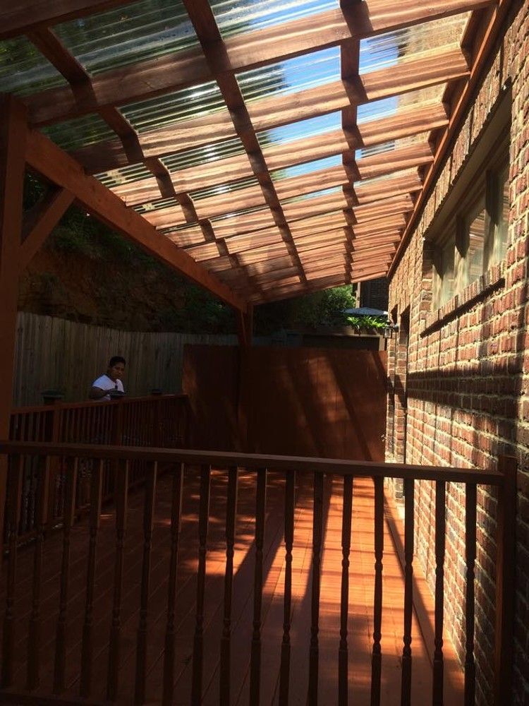 Deck with a clear corrugated roof system – photo 12